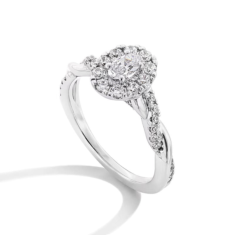 0.75 CT. TW Oval Diamond Frame Twist Shank Engagement Ring in 14K White Gold