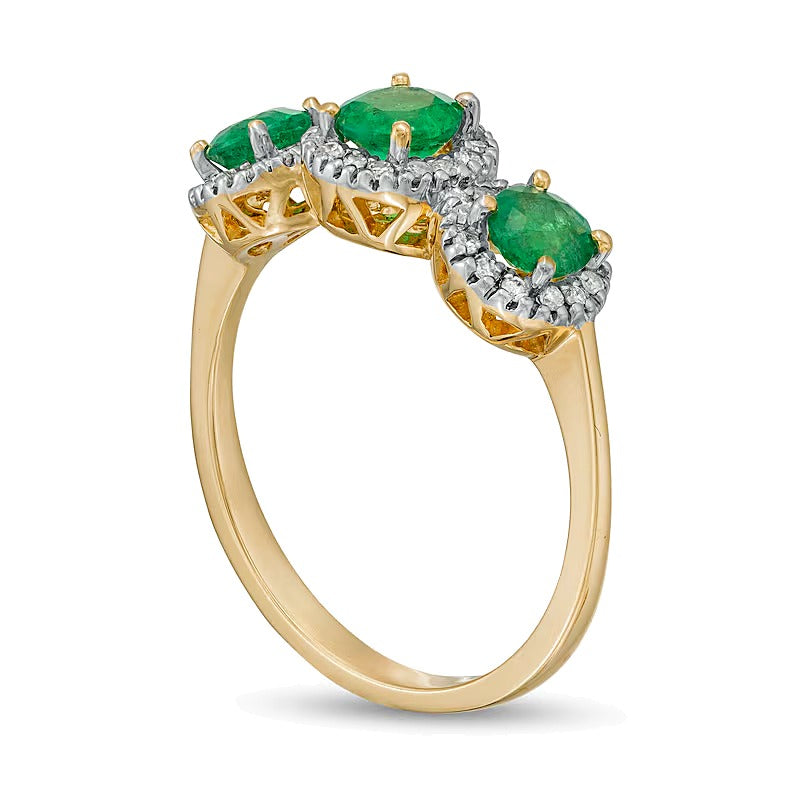 4.5mm Emerald and 0.2 CT. TW Diamond Frame Three Stone Ring in 14K Gold