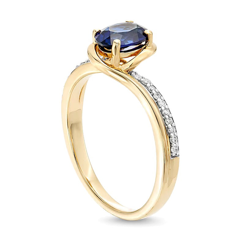 Oval Blue Lab-Created Sapphire and 0.1 CT. TW Diamond Bypass Ring in 10K Gold