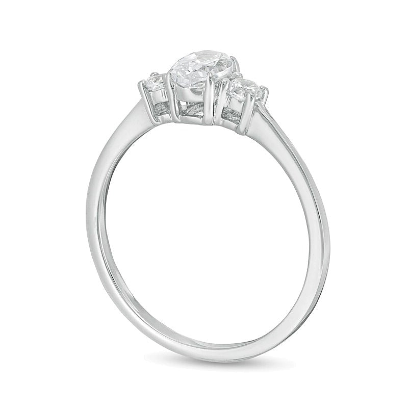 0.63 CT. TW Oval and Round Diamond Three Stone Engagement Ring in 14K White Gold