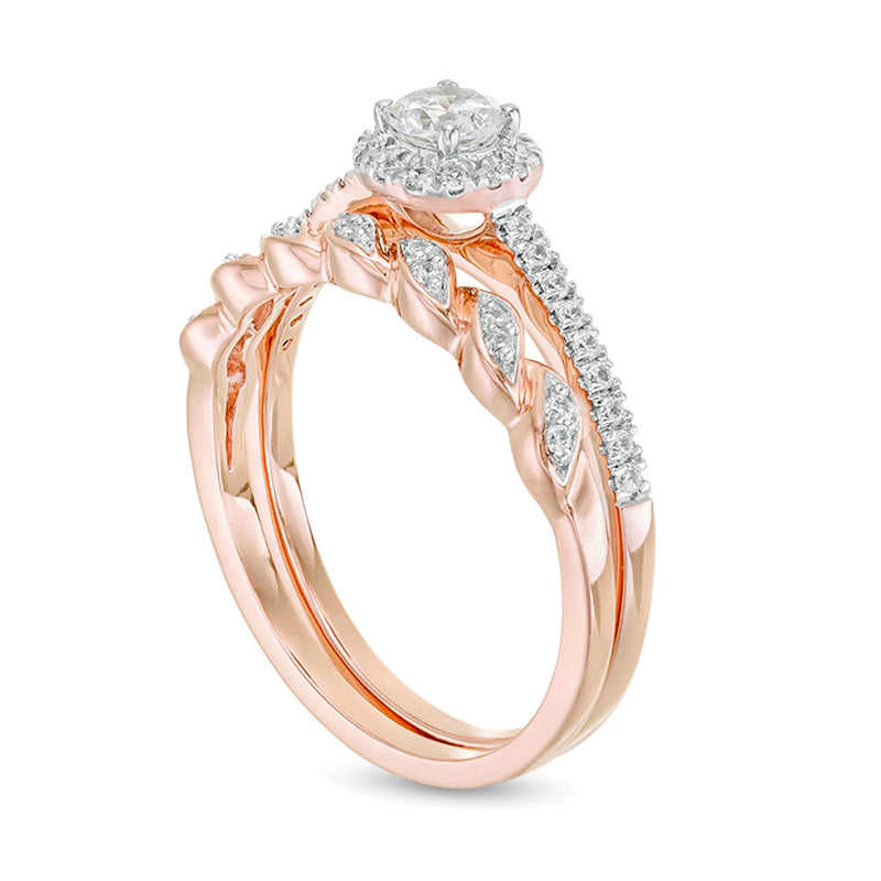 0.5 CT. TW Diamond Frame Twist Shank Bridal Set in 10K Rose Gold