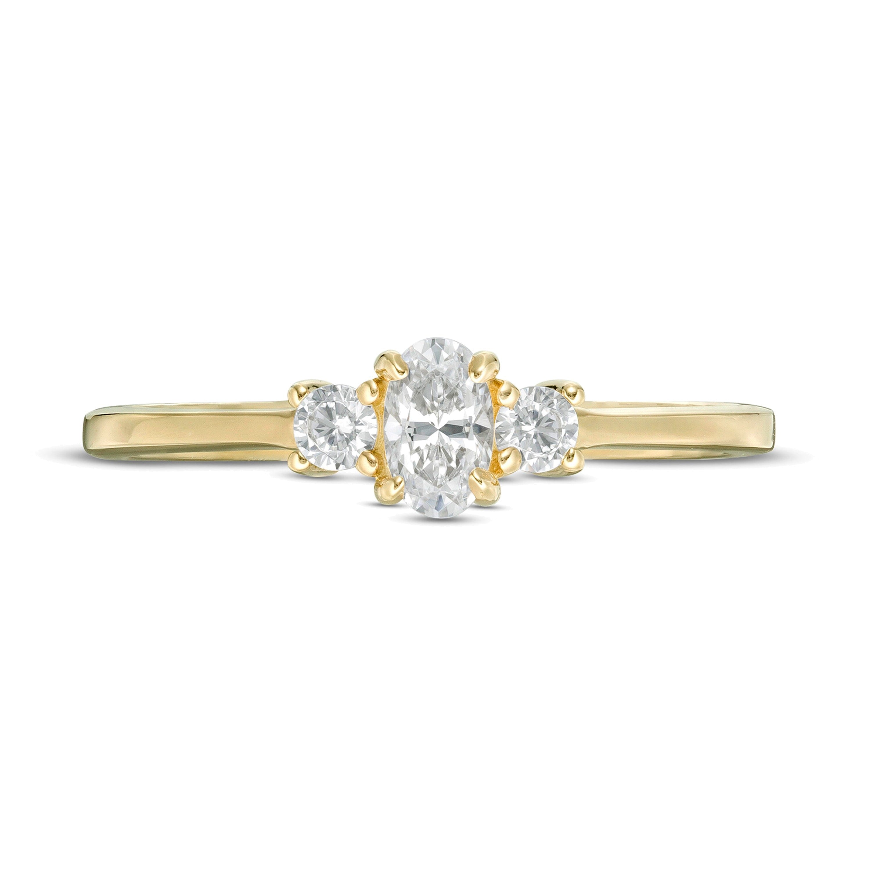 0.5 CT. TW Oval and Round Diamond Three Stone Engagement Ring in 14K Gold