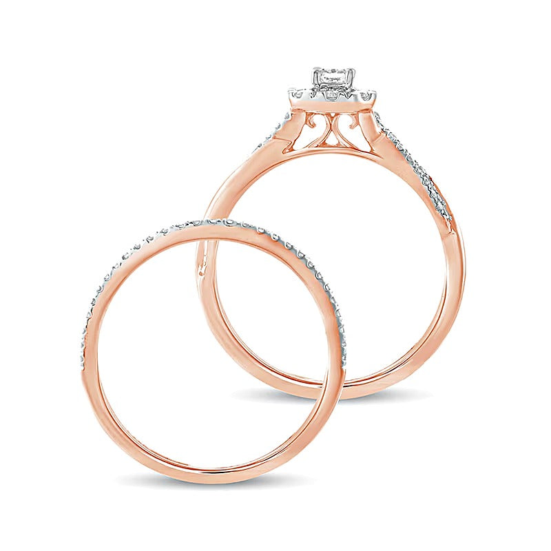 0.5 CT. TW Emerald-Cut Diamond Frame Twist Shank Bridal Set in 10K Rose Gold