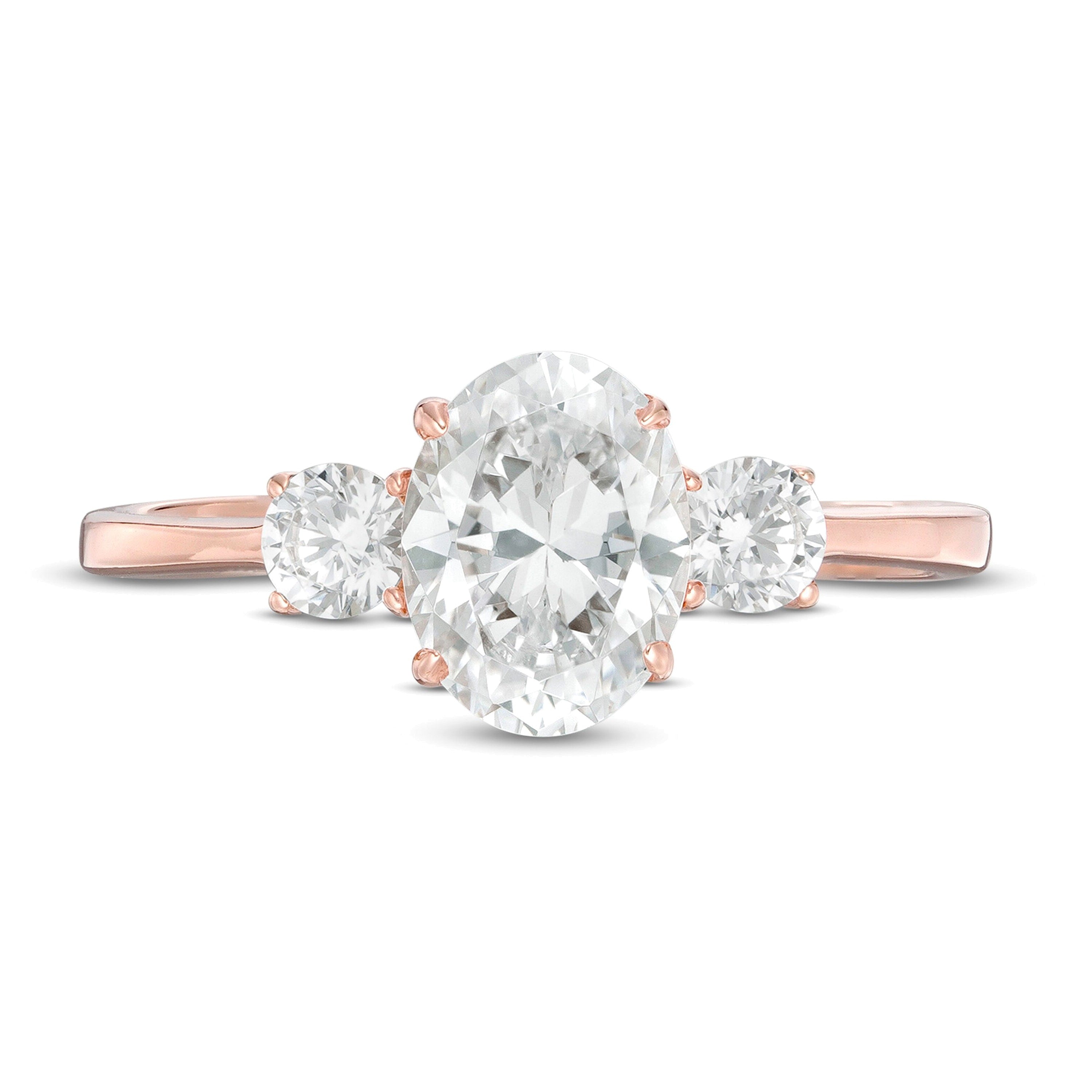 1.25 CT. TW Oval and Round Diamond Three Stone Engagement Ring in 14K Rose Gold