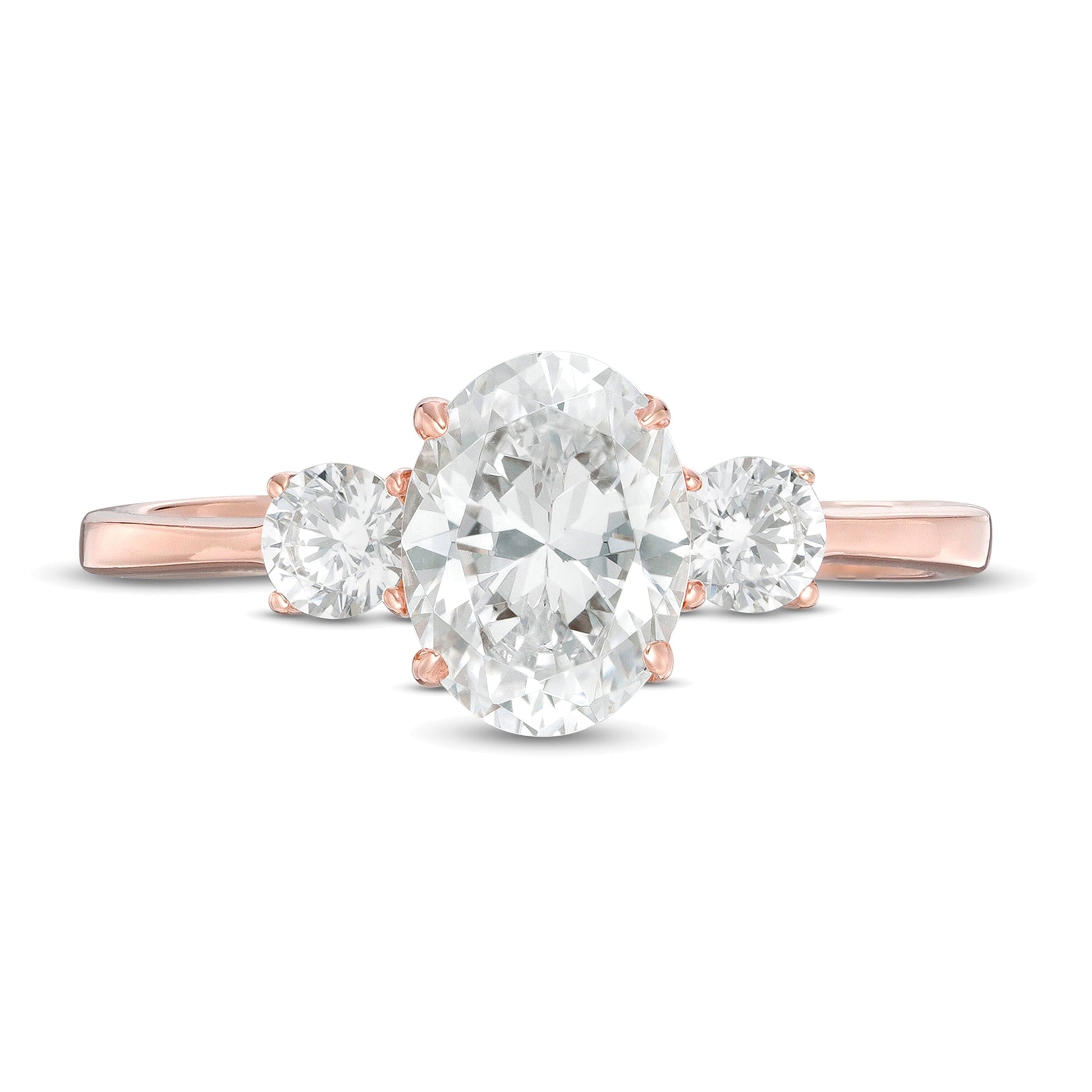 1.25 CT. TW Oval and Round Diamond Three Stone Engagement Ring in 14K Rose Gold