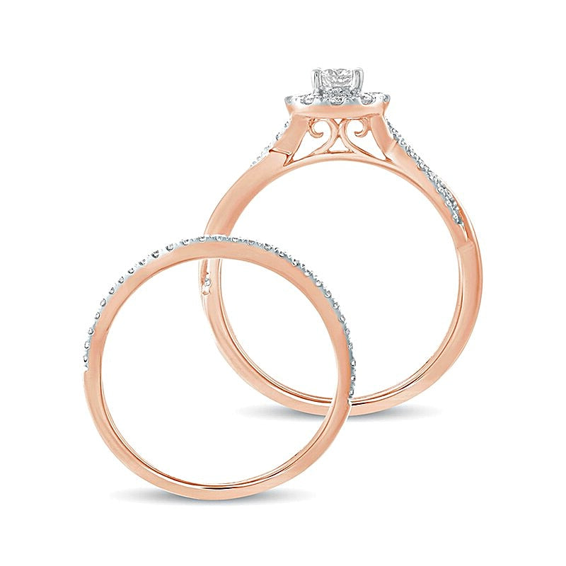 0.5 CT. TW Diamond Frame Twist Shank Bridal Set in 10K Rose Gold