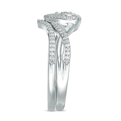 0.2 CT. TW Diamond Heart Frame Twist Bridal Set in 10K White Gold