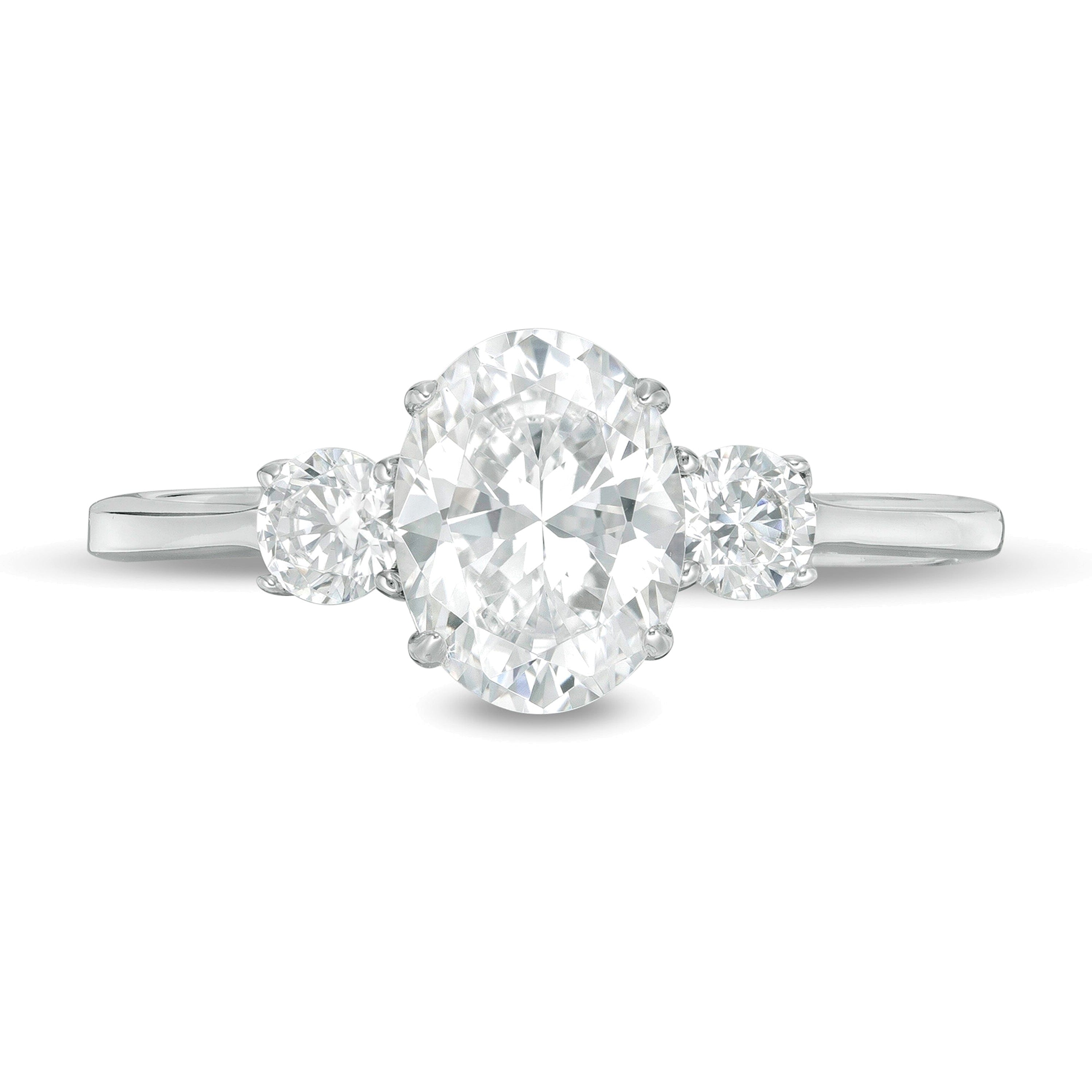 1.25 CT. TW Oval and Round Diamond Three Stone Engagement Ring in 14K White Gold