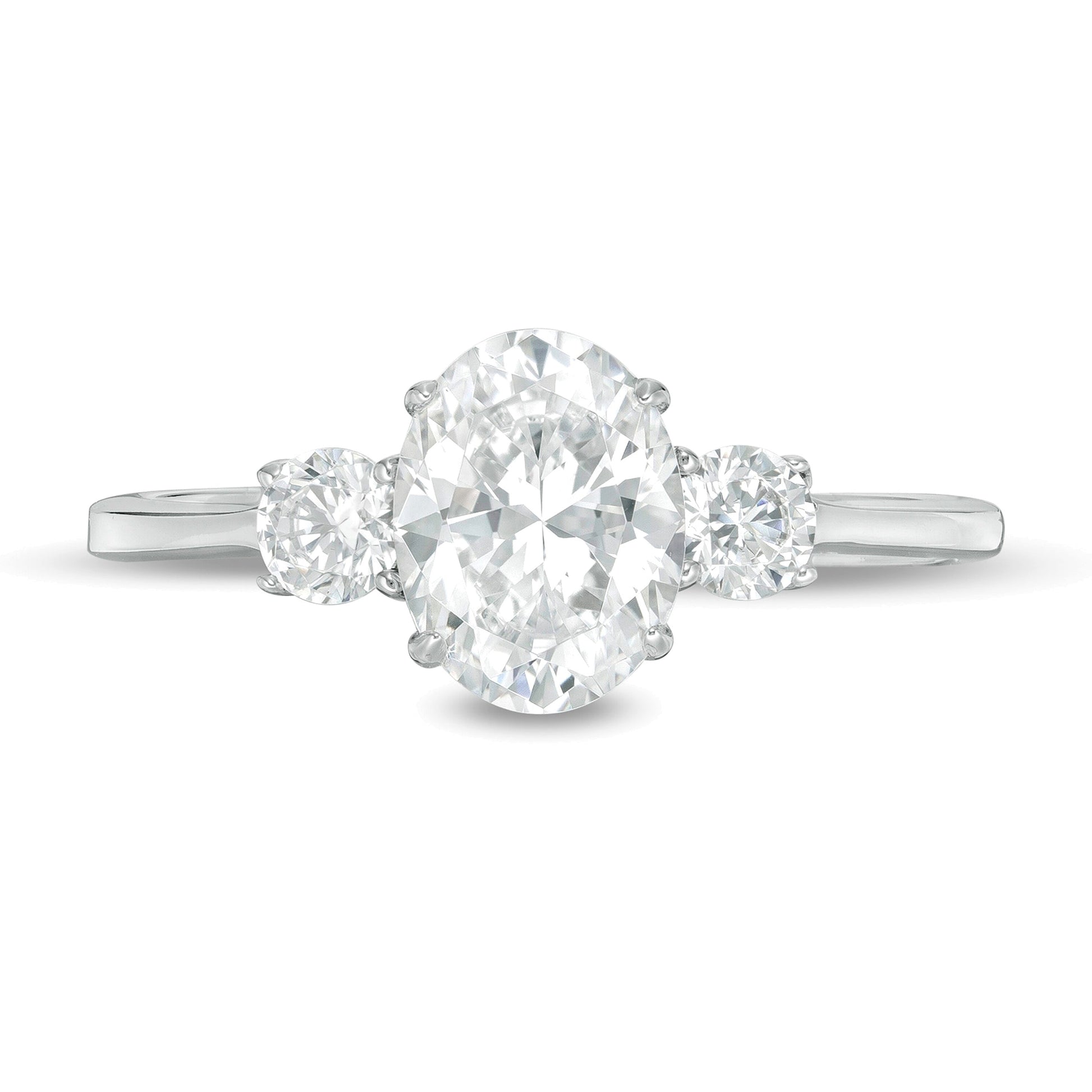 1.25 CT. TW Oval and Round Diamond Three Stone Engagement Ring in 14K White Gold