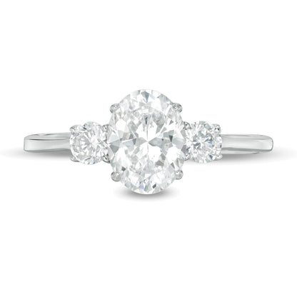 1.25 CT. TW Oval and Round Diamond Three Stone Engagement Ring in 14K White Gold