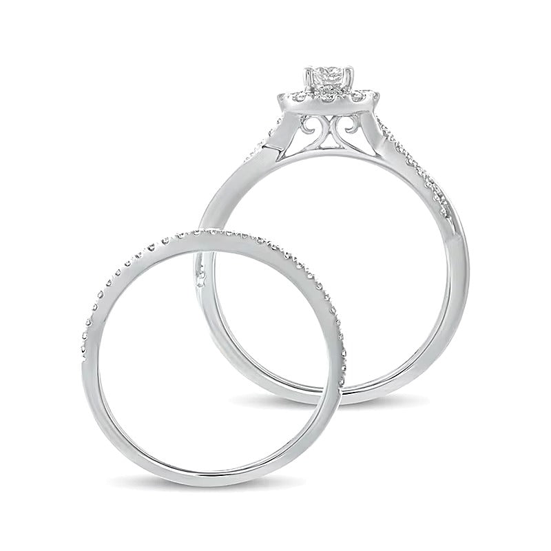 0.5 CT. TW Diamond Frame Twist Shank Bridal Set in 10K White Gold