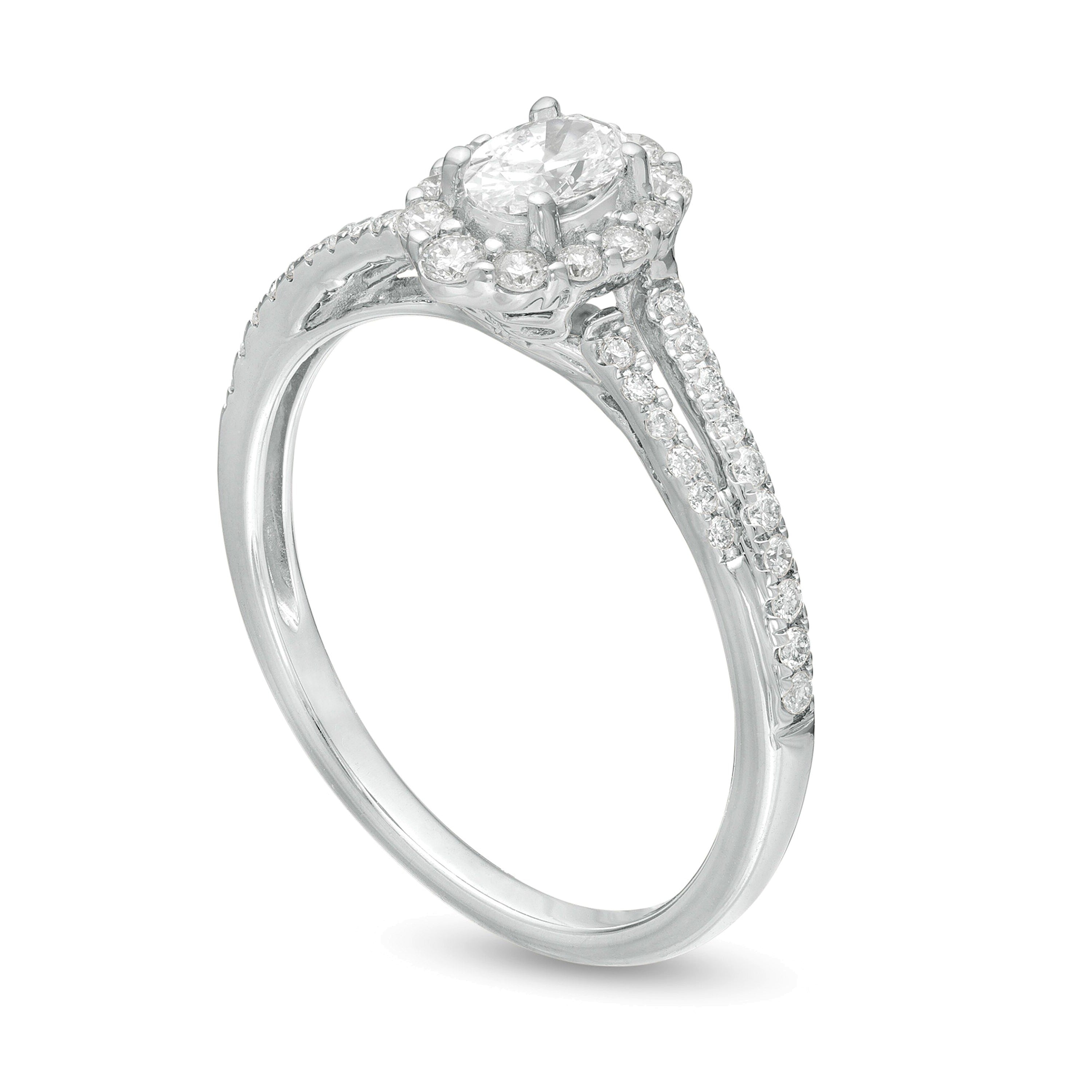 0.5 CT. TW Oval Diamond Frame Split Shank Engagement Ring in 10K White Gold