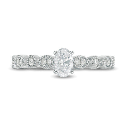 0.5 CT. TW Oval Diamond with Marquise Shapes Vintage-Style Engagement Ring in 10K White Gold