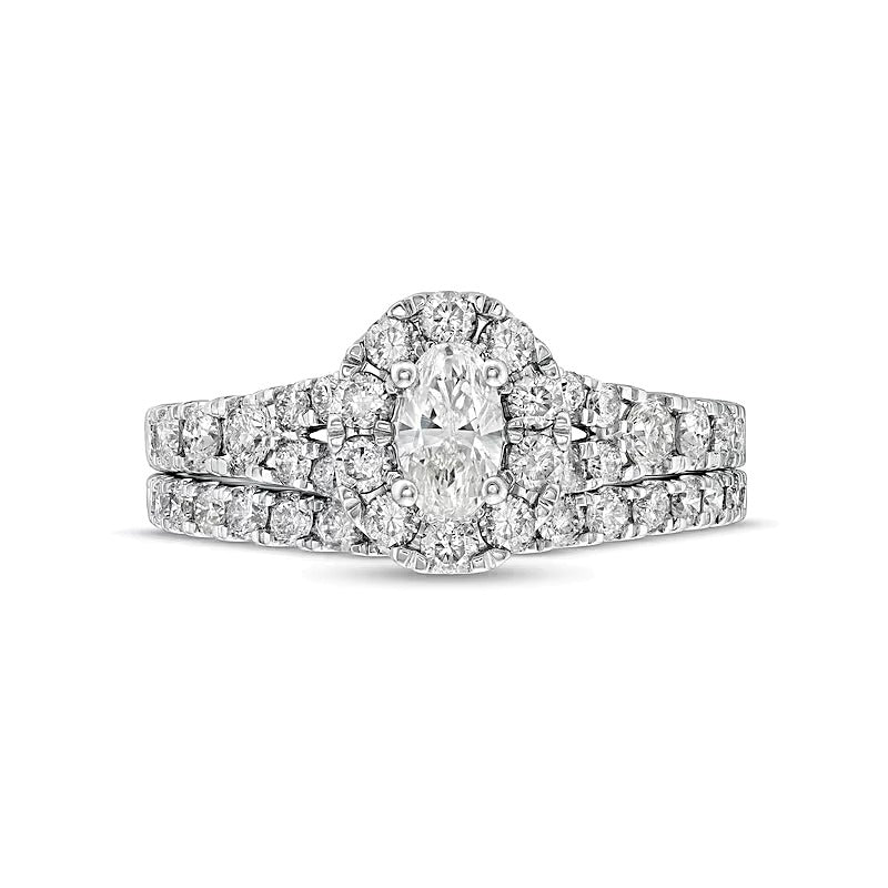 1.5 CT. TW Oval Diamond Frame Split Shank Bridal Set in 10K White Gold