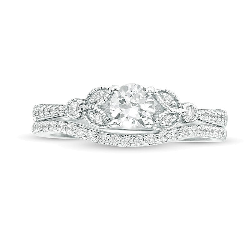 4.5mm Lab-Created White Sapphire and 0.17 CT. TW Diamond Leaf-Sides Vintage-Style Bridal Set in Sterling Silver