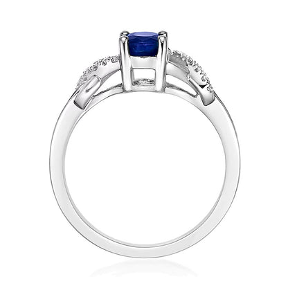 Oval Blue Sapphire and 0.17 CT. TW Diamond Crossover Split Shank Ring in 10K White Gold