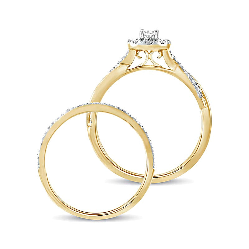 0.5 CT. TW Oval Diamond Frame Twist Shank Bridal Set in 10K Gold