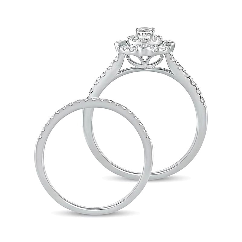 0.63 CT. TW Oval Diamond Double Frame Bridal Set in 10K White Gold