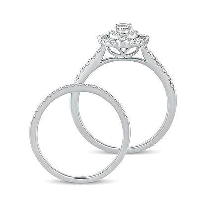 0.63 CT. TW Oval Diamond Double Frame Bridal Set in 10K White Gold