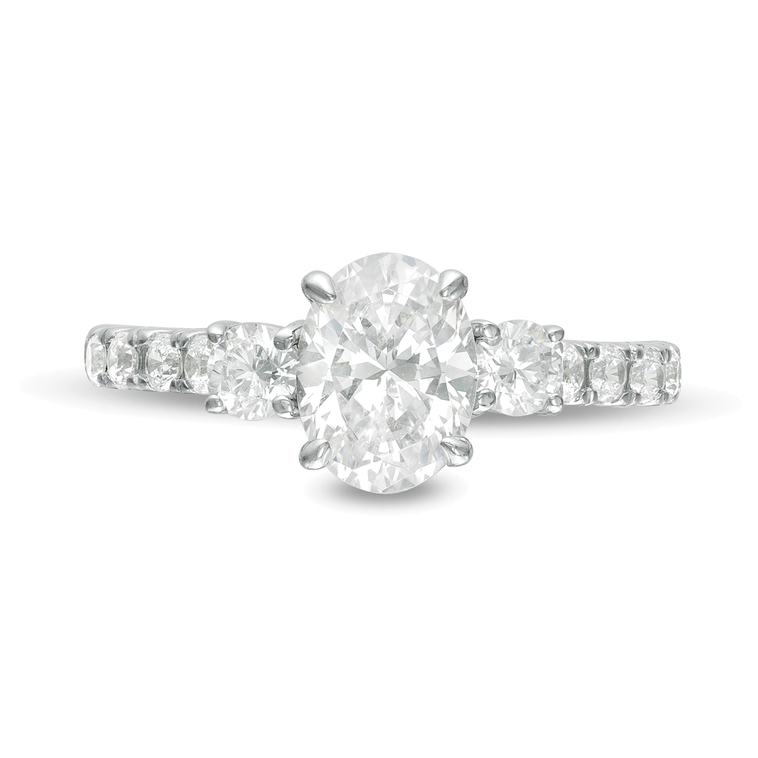 1.75 CT. TW Oval and Round Diamond Three Stone Engagement Ring in 14K White Gold