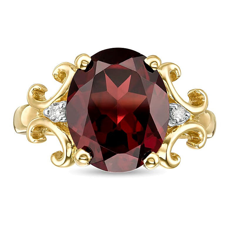 Oval Garnet and 0.05 CT. TW Diamond Scroll Frame Ring in 10K Gold