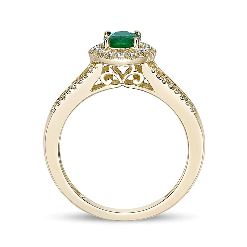 Oval Emerald and 0.25 CT. TW Diamond Frame Split Shank Ring in 10K Gold