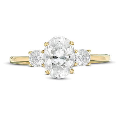 1.25 CT. TW Oval and Round Diamond Three Stone Engagement Ring in 14K Gold