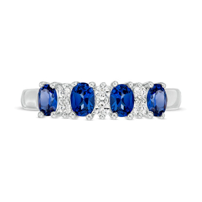 Oval Blue Sapphire and 0.1 CT. TW Diamond Duo Alternating Four Stone Ring in 14K White Gold