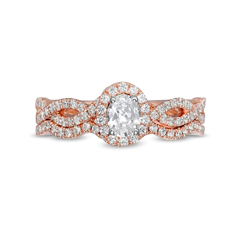 1.0 CT. TW Oval Diamond Frame Split Shank Bridal Set in 14K Rose Gold (I/I2)