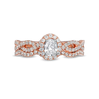 1.0 CT. TW Oval Diamond Frame Split Shank Bridal Set in 14K Rose Gold (I/I2)