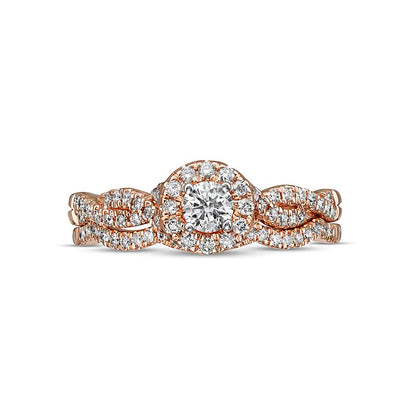 0.5 CT. TW Diamond Frame Twist Shank Bridal Set in 10K Rose Gold (I/I2)