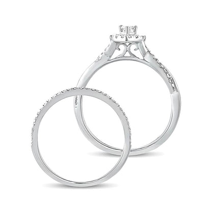 0.5 CT. TW Pear-Shaped Diamond Frame Twist Shank Bridal Set in 10K White Gold