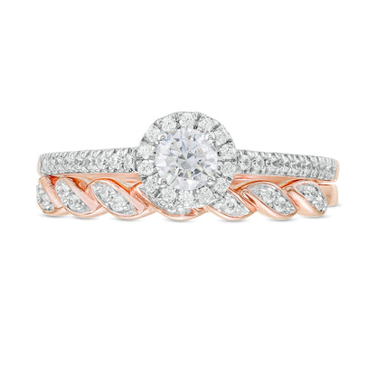 0.5 CT. TW Diamond Frame Twist Shank Bridal Set in 10K Rose Gold