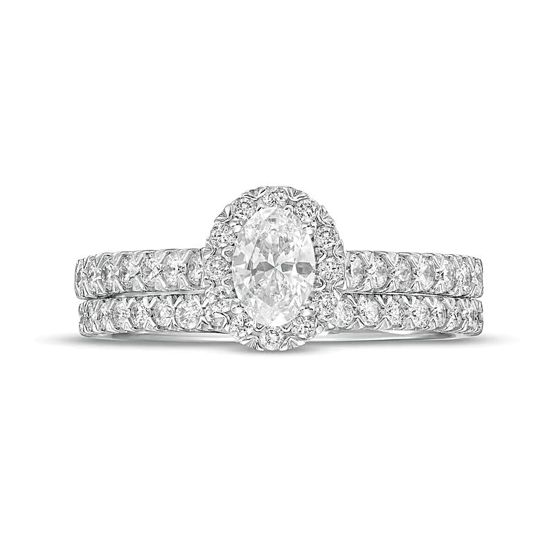 1.0 CT. TW Oval Diamond Frame Bridal Set in 10K White Gold