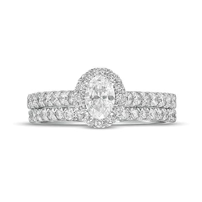 1.0 CT. TW Oval Diamond Frame Bridal Set in 10K White Gold