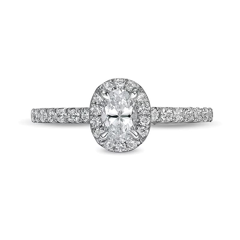 1.0 CT. TW Oval Diamond Frame Engagement Ring in 14K White Gold (I/I2)