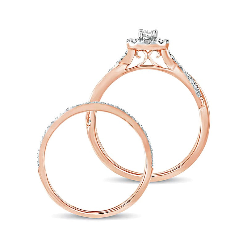 0.5 CT. TW Oval Diamond Frame Twist Shank Bridal Set in 10K Rose Gold