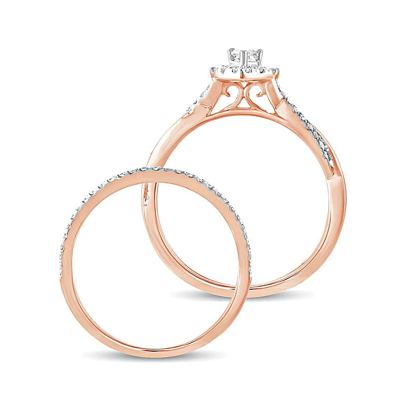 0.5 CT. TW Pear-Shaped Diamond Frame Twist Shank Bridal Set in 10K Rose Gold