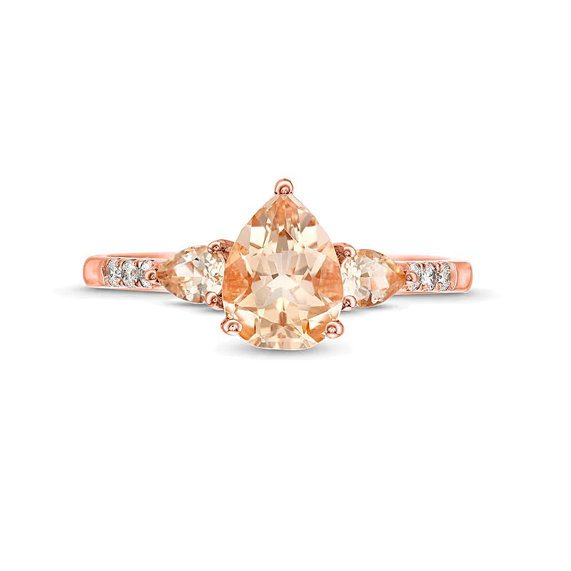 Pear-Shaped Morganite and 0.07 CT. TW Diamond Three Stone Ring in 10K Rose Gold