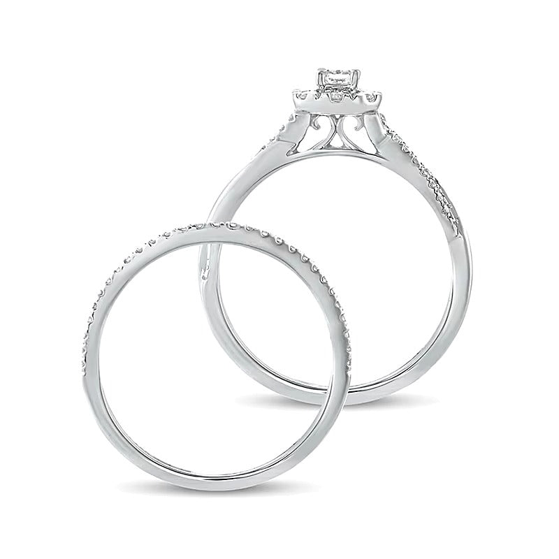 0.5 CT. TW Emerald-Cut Diamond Frame Twist Shank Bridal Set in 10K White Gold