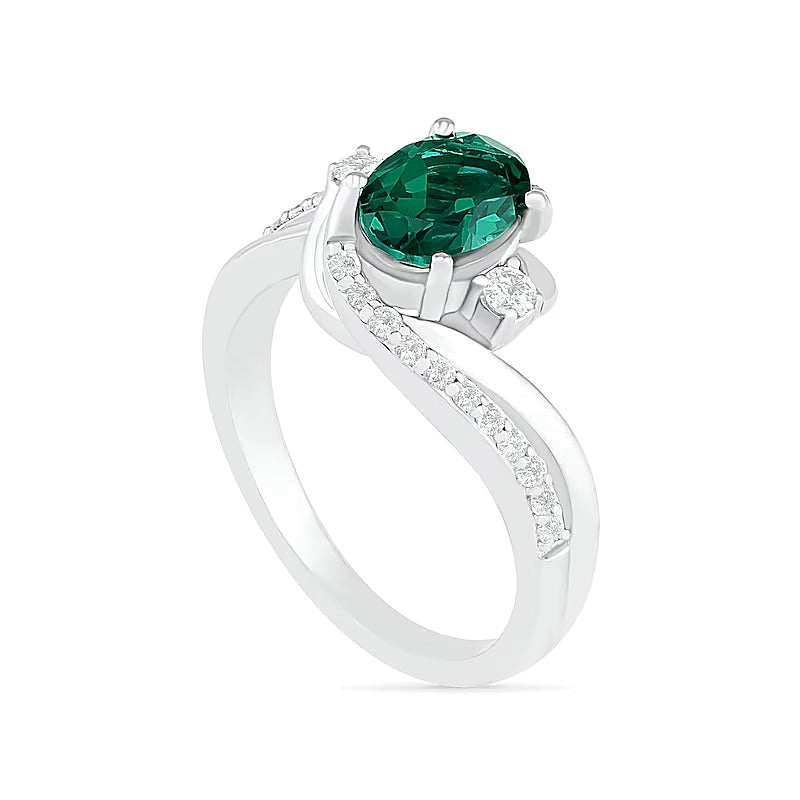 Oval Lab-Created Emerald and White Sapphire Side Accent Double Bypass Split Shank Bridal Set in Sterling Silver