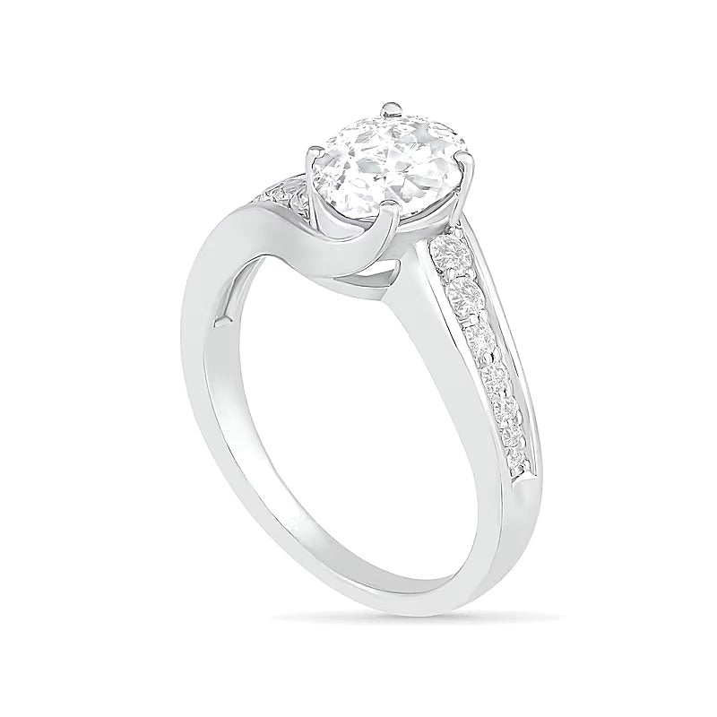 Oval White Lab-Created Sapphire Bypass Bridal Set in Sterling Silver