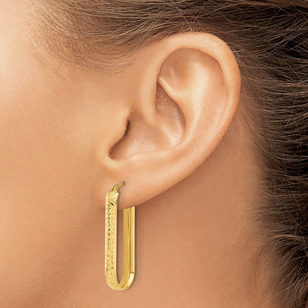 10K Yellow Gold Polished And Diamond Cut Oval Hoop Earrings