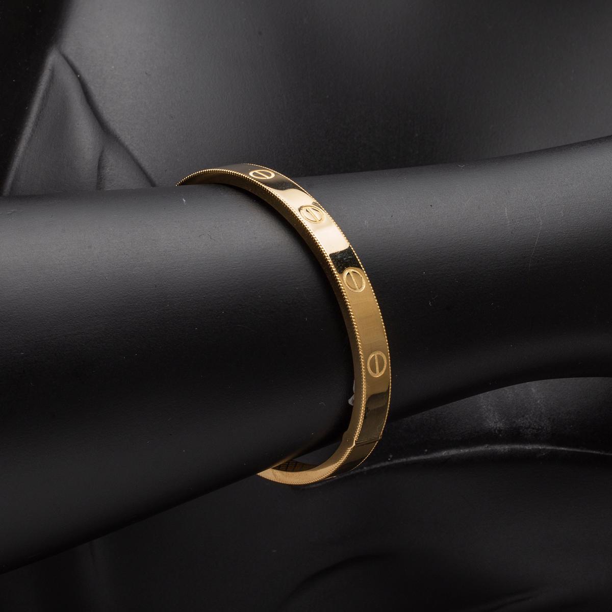 14K Yellow Gold Screw Detail Hinged Cuff Bangle