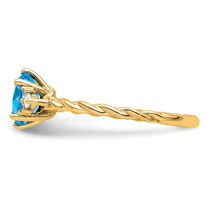 14K Yellow Gold Diamond and 7x5 Oval December/Blue Topaz Size 7 Twisted Ring