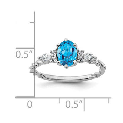 14K White Gold Diamond and 7x5 Oval December/Blue Topaz Size 7 Twisted Ring