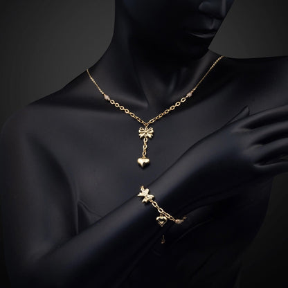 14K Yellow Gold Heart Dangle Cubic Zirconia Necklace and Bracelet Set