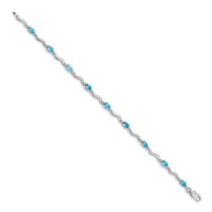 10K White Gold Fancy Diamond And Blue Topaz Bracelet