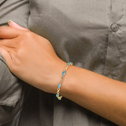 10K Yellow Gold Blue Topaz And Diamond Infinity Bracelet