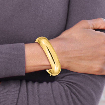 14K Yellow Gold 11/16 High Polished 17.00mm Hinged Oval Bangle Bracelet